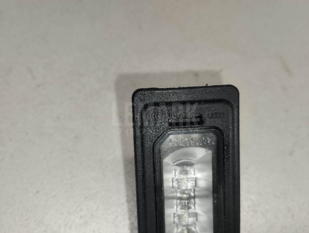 Фонарь подсветки номера