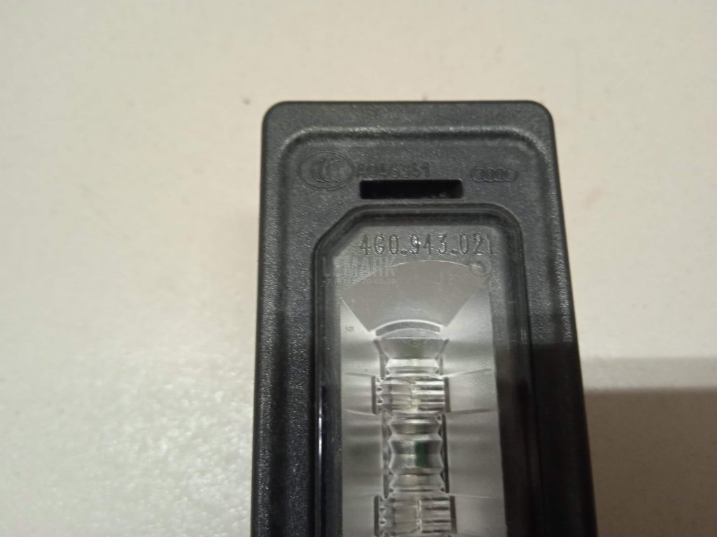 Фонарь подсветки номера