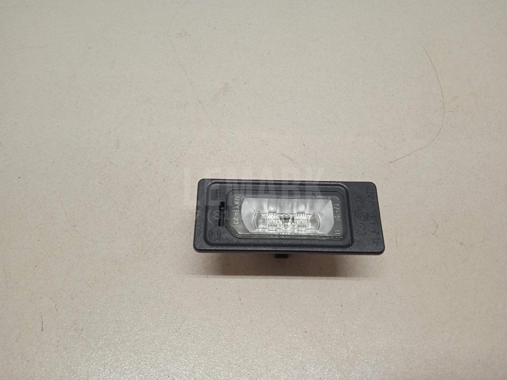 Фонарь подсветки номера