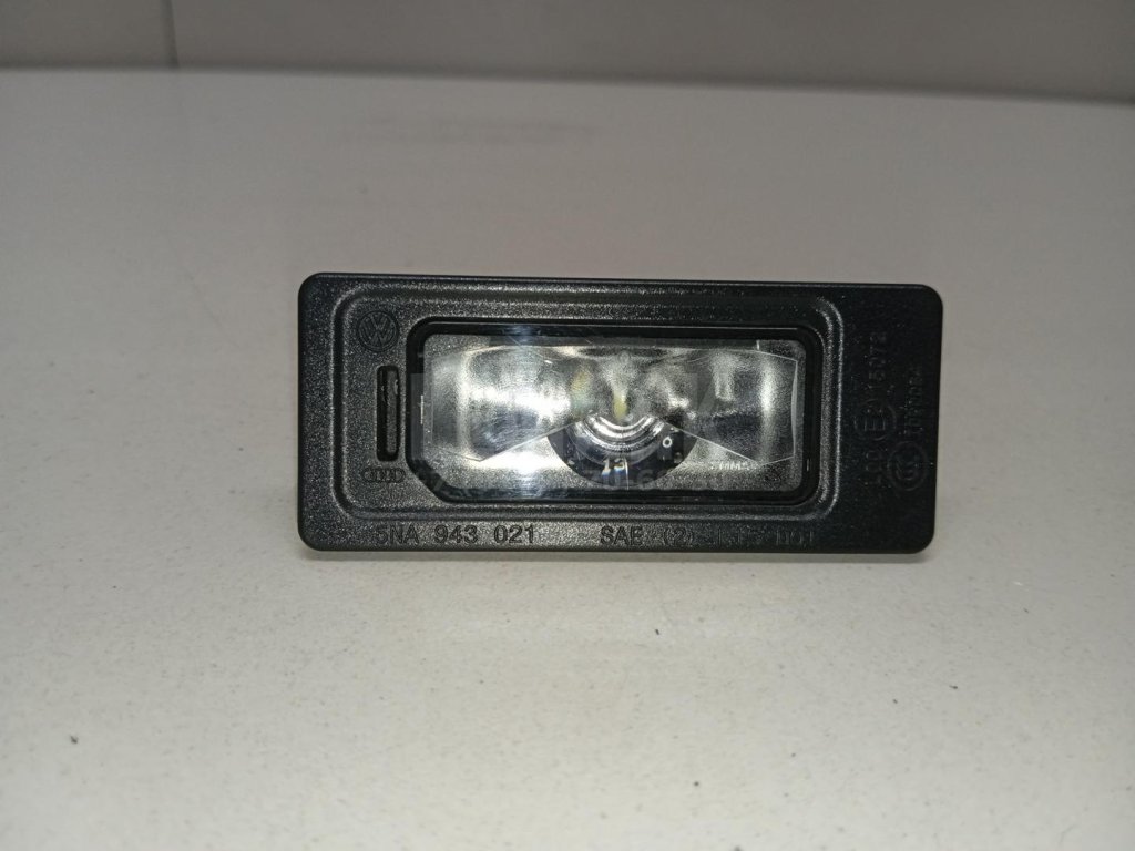 Фонарь подсветки номера