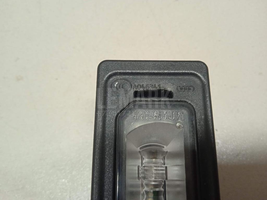 Фонарь подсветки номера