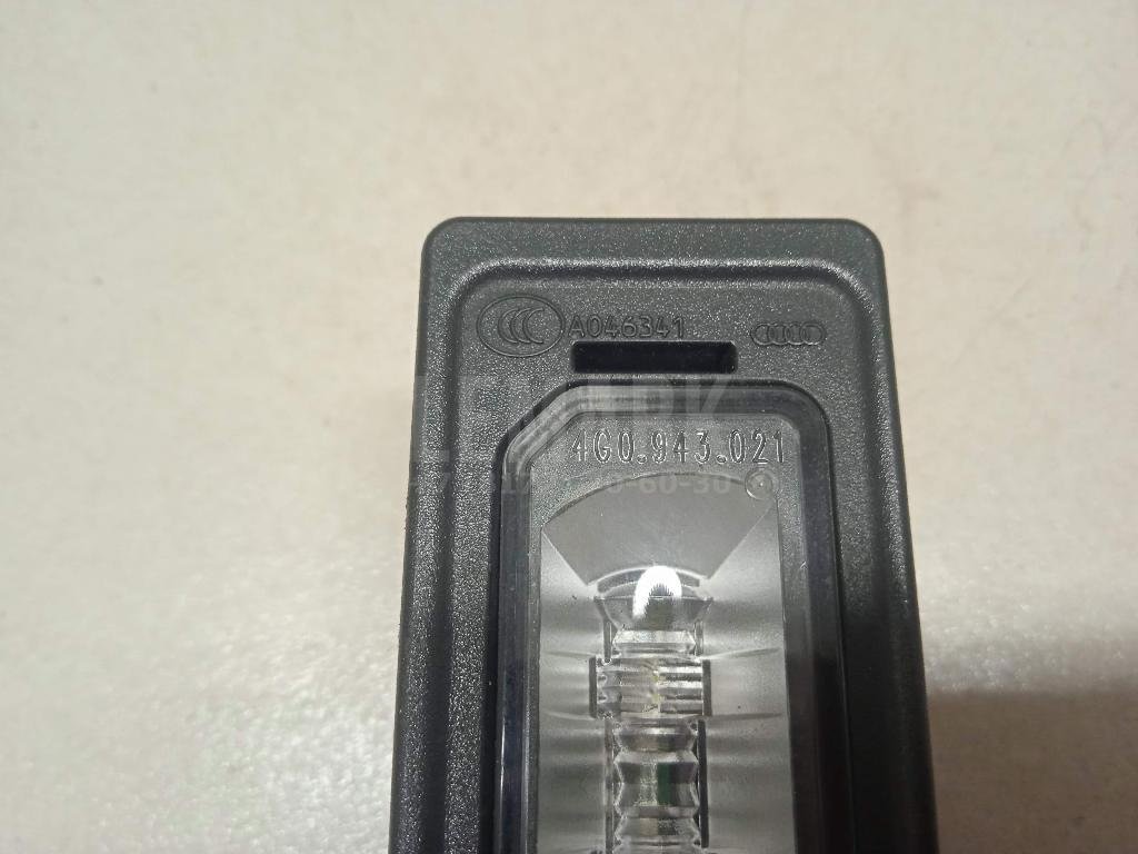 Фонарь подсветки номера