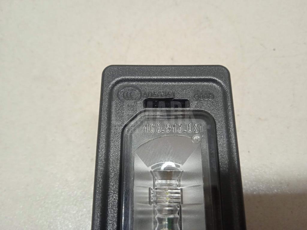 Фонарь подсветки номера