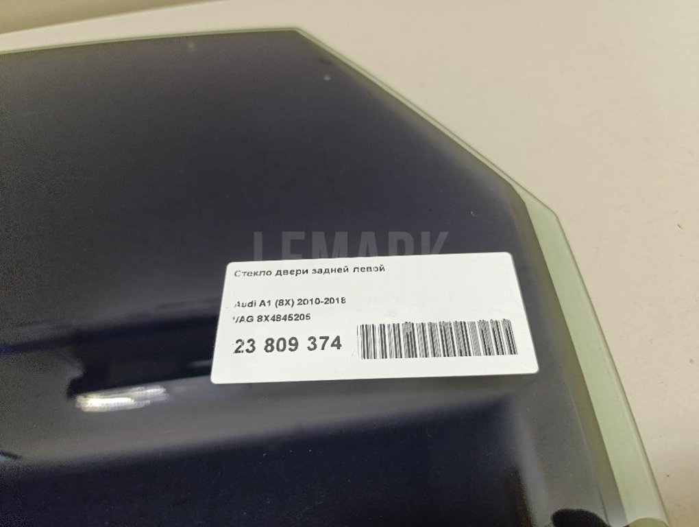 Стекло двери задней левой