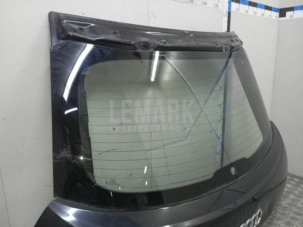 Стекло двери багажника