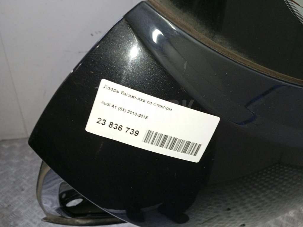 Стекло двери багажника