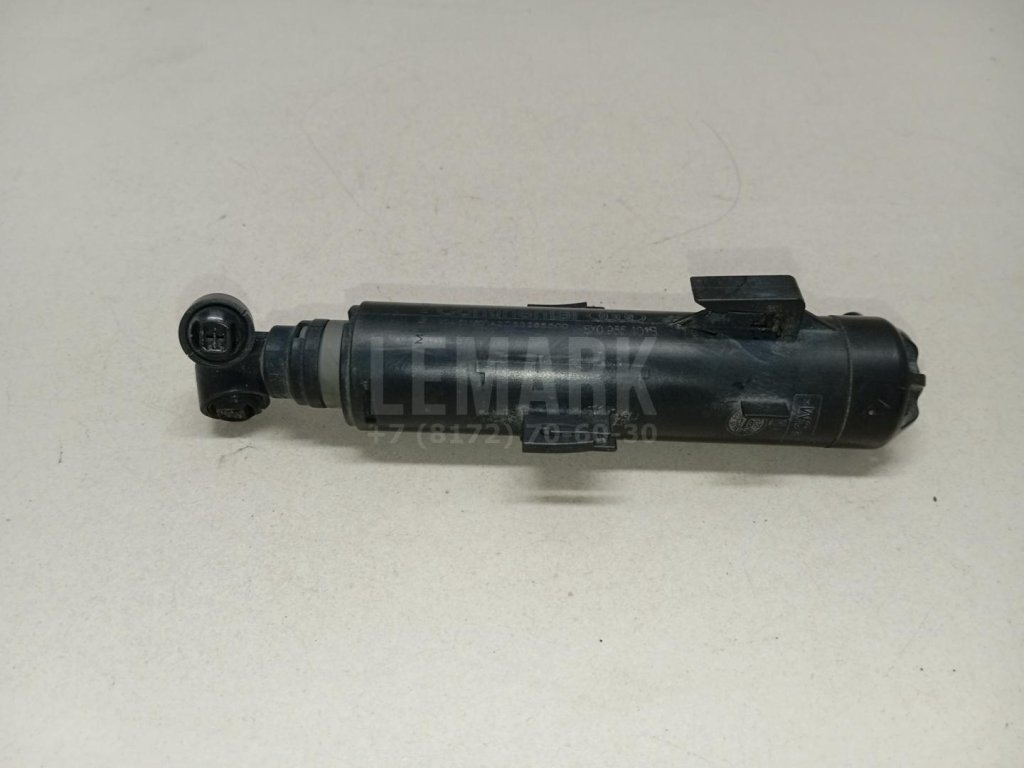 Форсунка омывателя фары