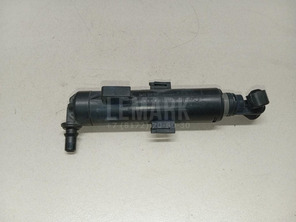 Форсунка омывателя фары