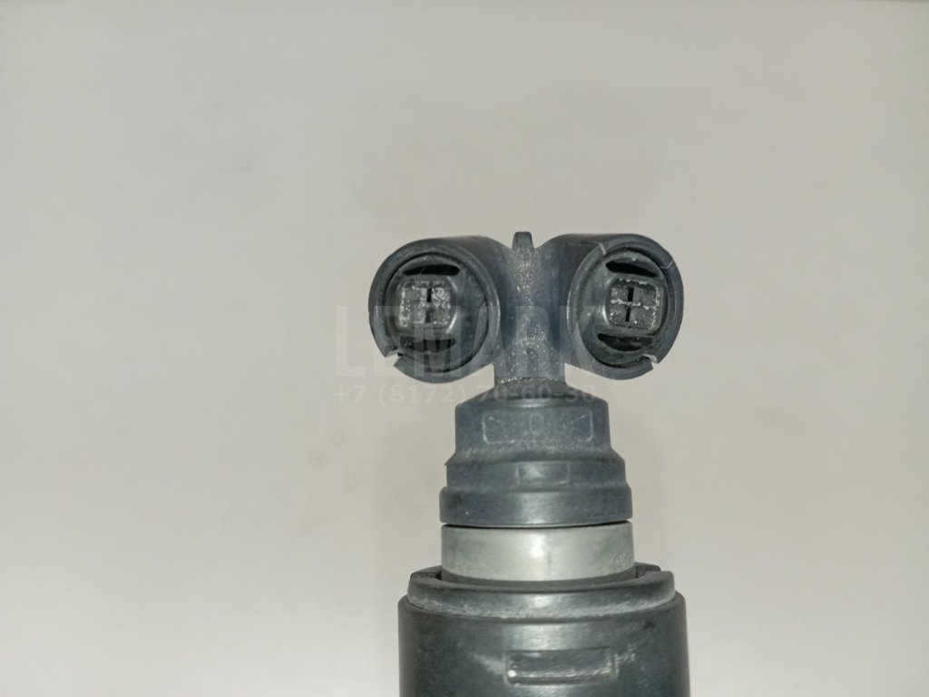 Форсунка омывателя фары