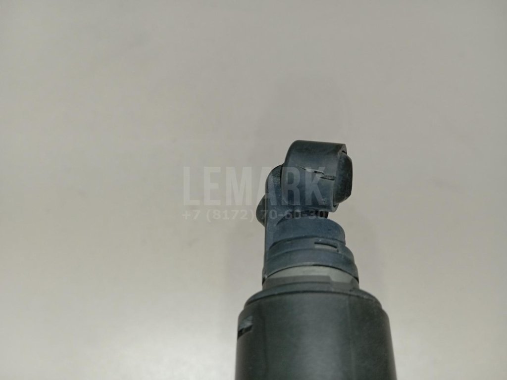 Форсунка омывателя фары