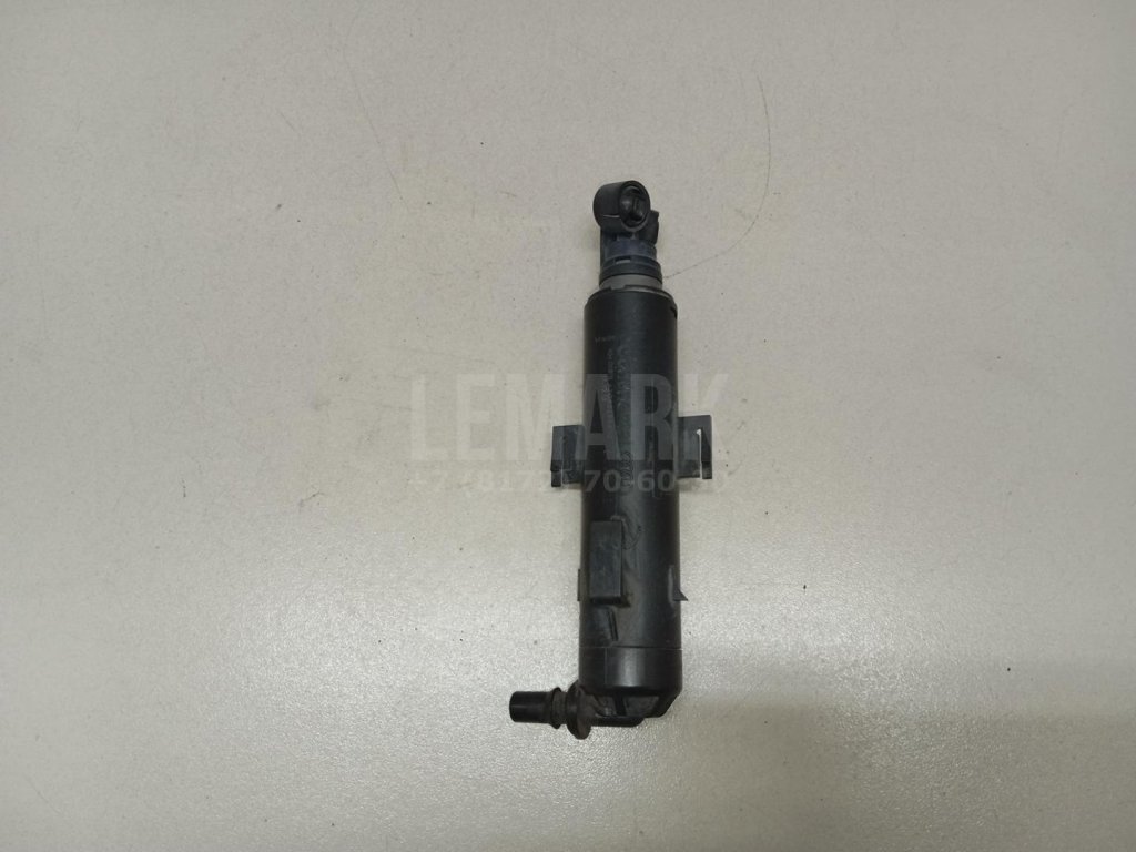 Форсунка омывателя фары