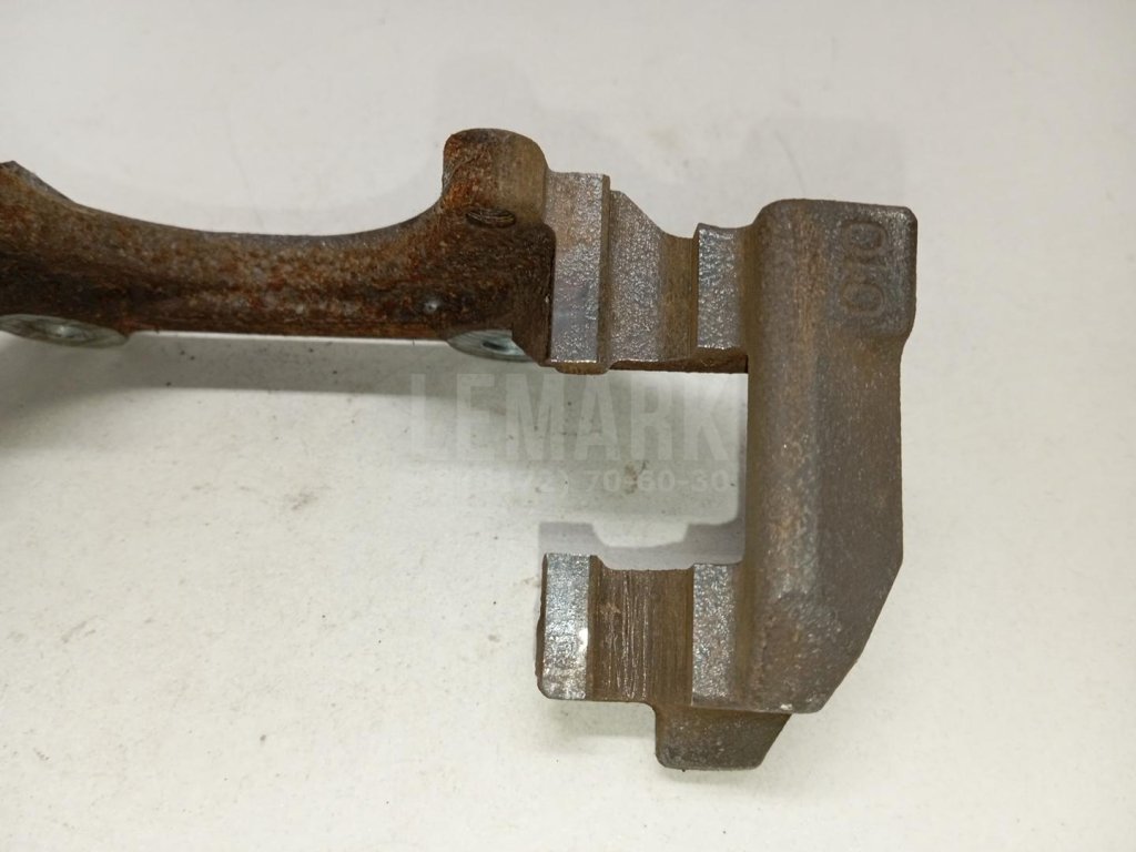 Скоба суппорта переднего