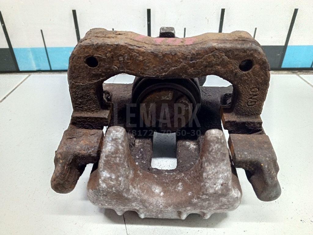 Суппорт тормозной задний левый