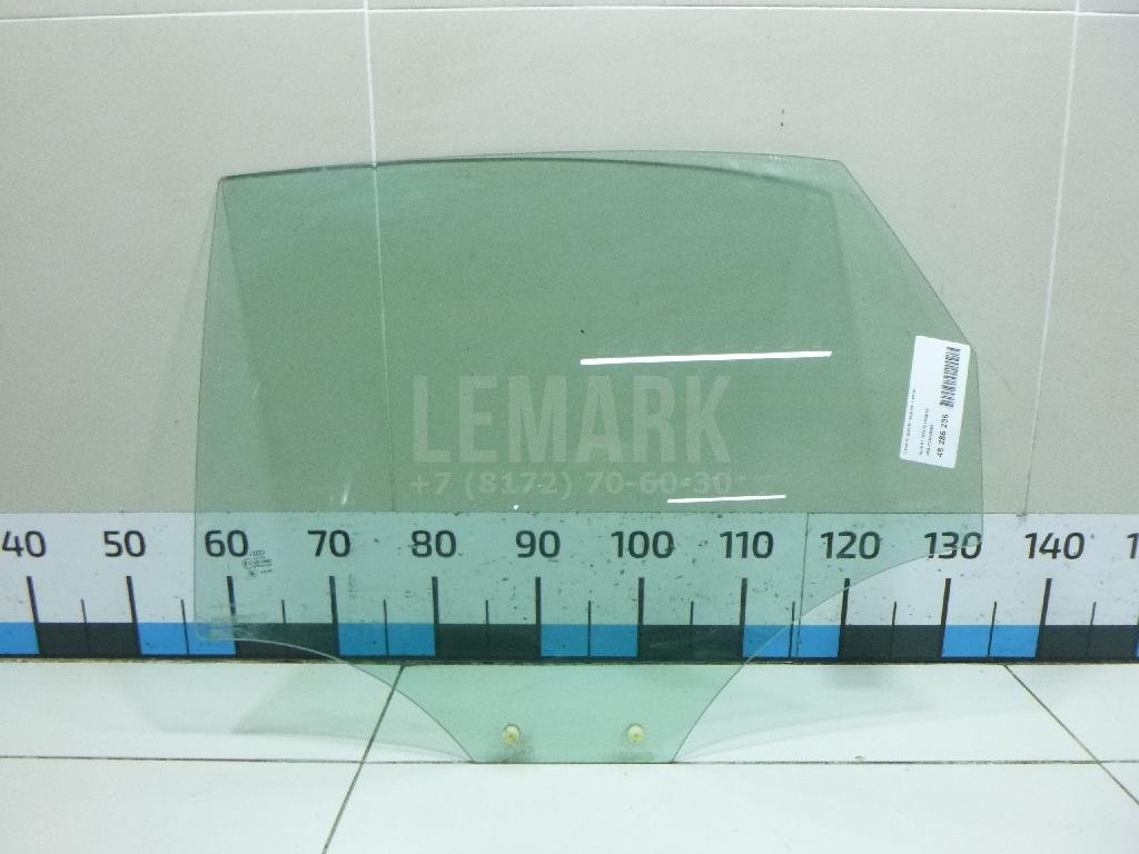 Стекло двери задней левой