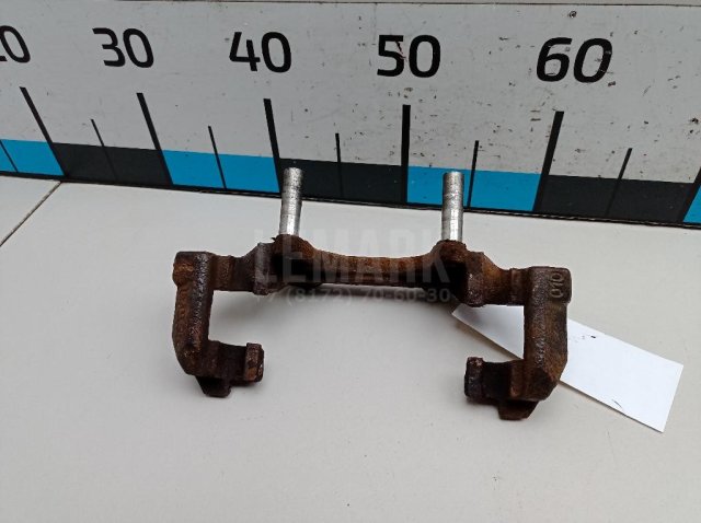 Скоба суппорта переднего