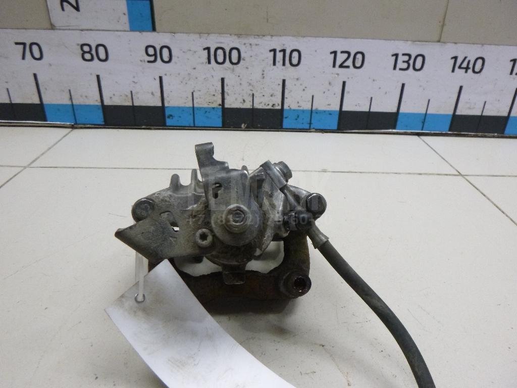 Суппорт тормозной задний левый