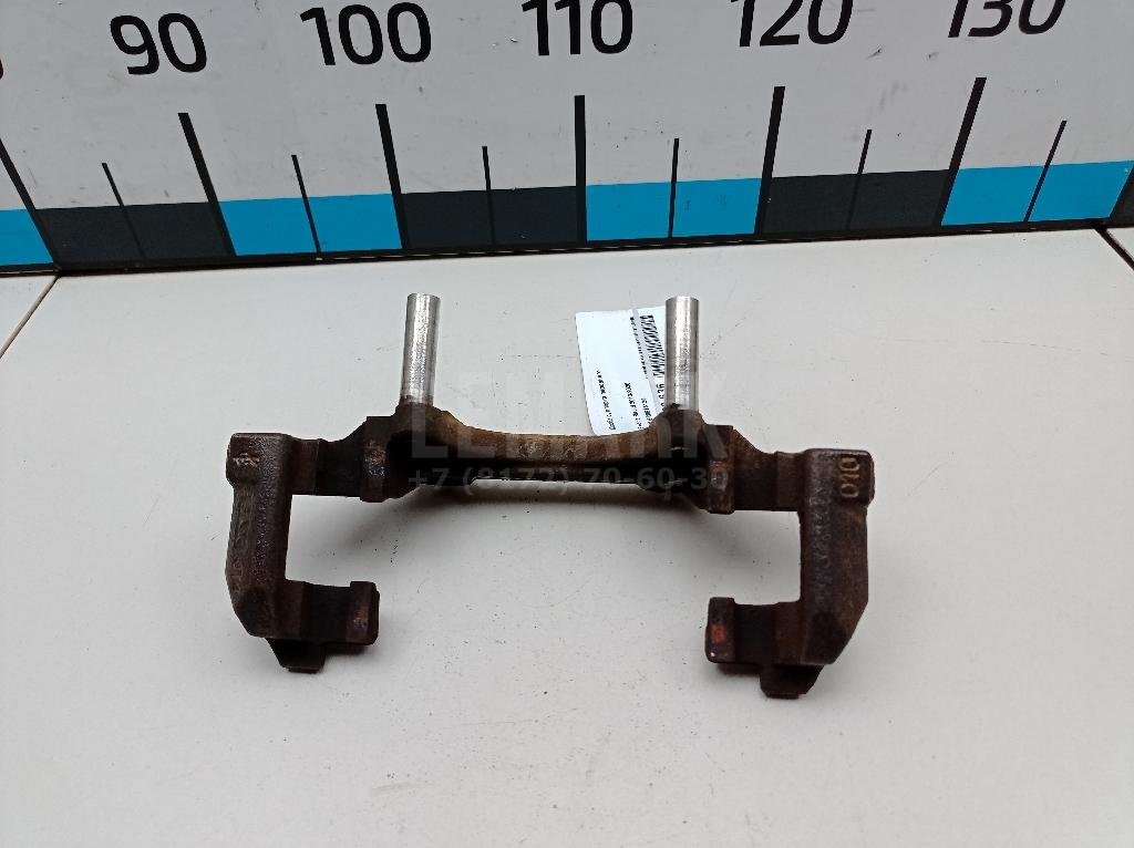 Скоба суппорта переднего