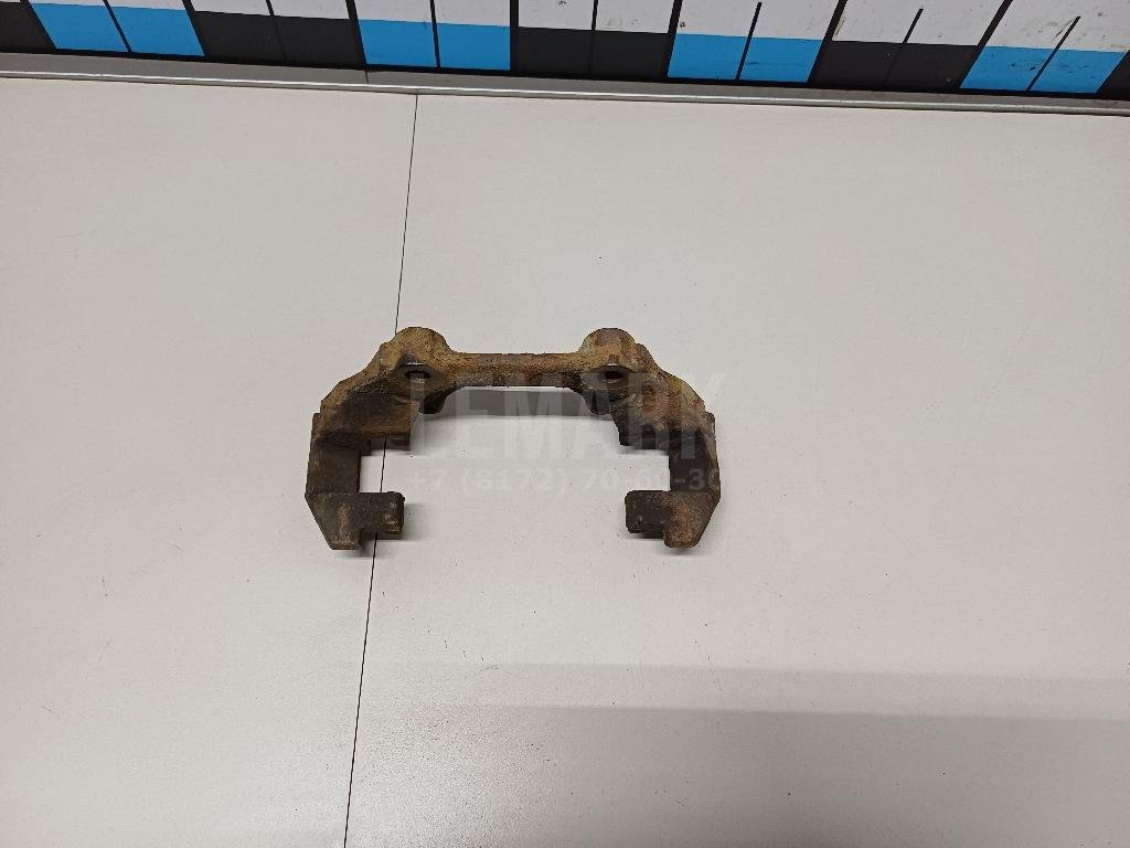 Скоба суппорта переднего