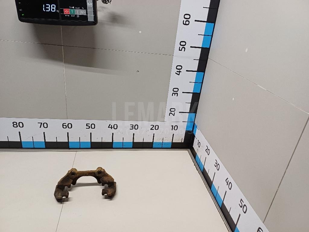 Скоба суппорта переднего