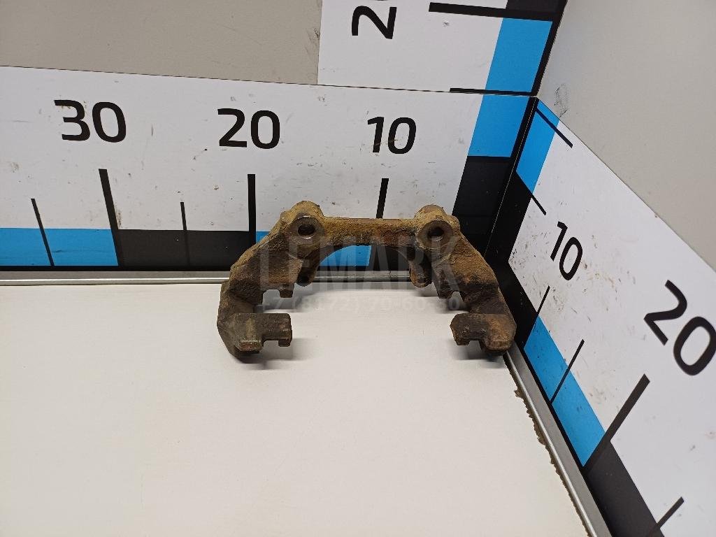 Скоба суппорта переднего