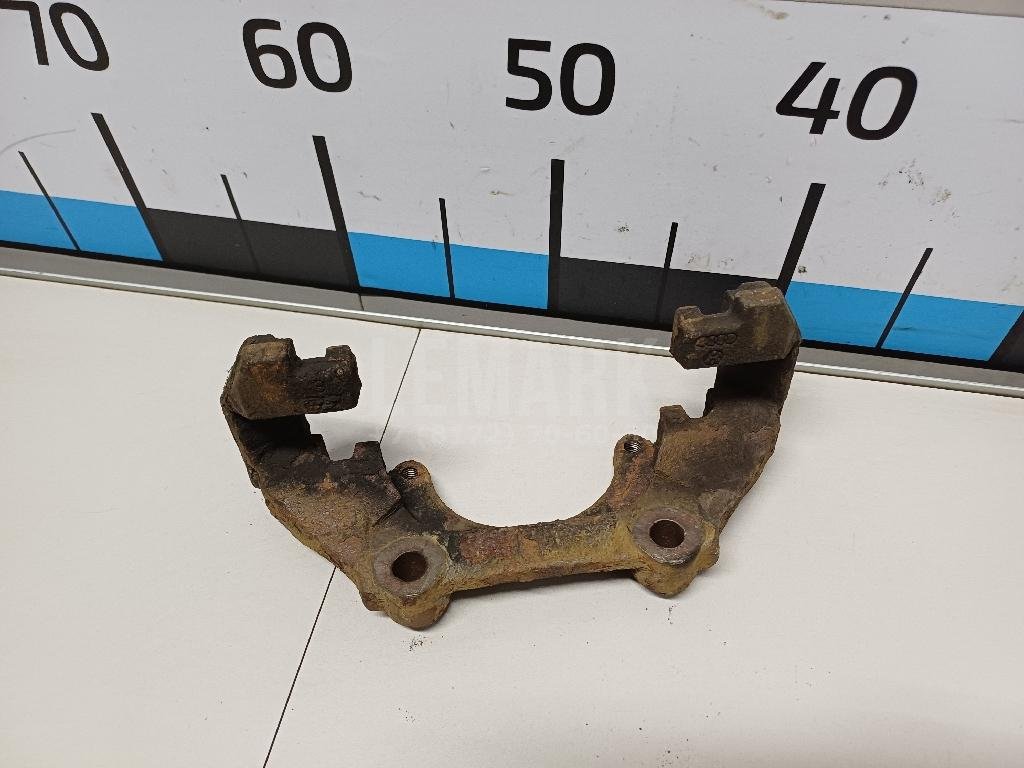 Скоба суппорта переднего