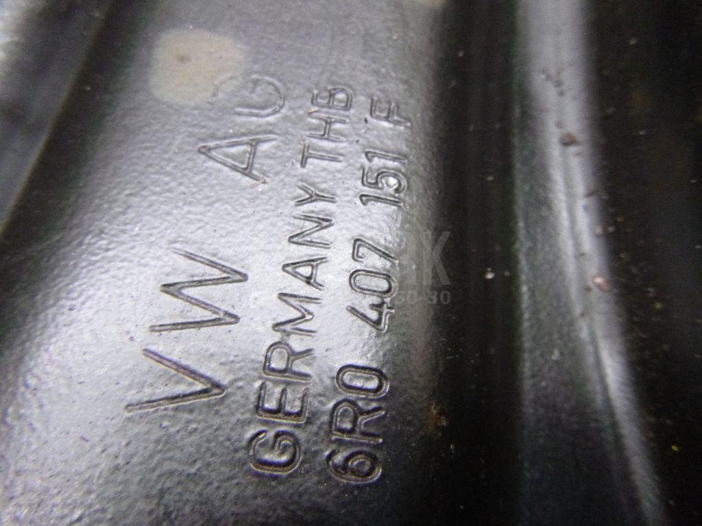 Рычаг передний левый