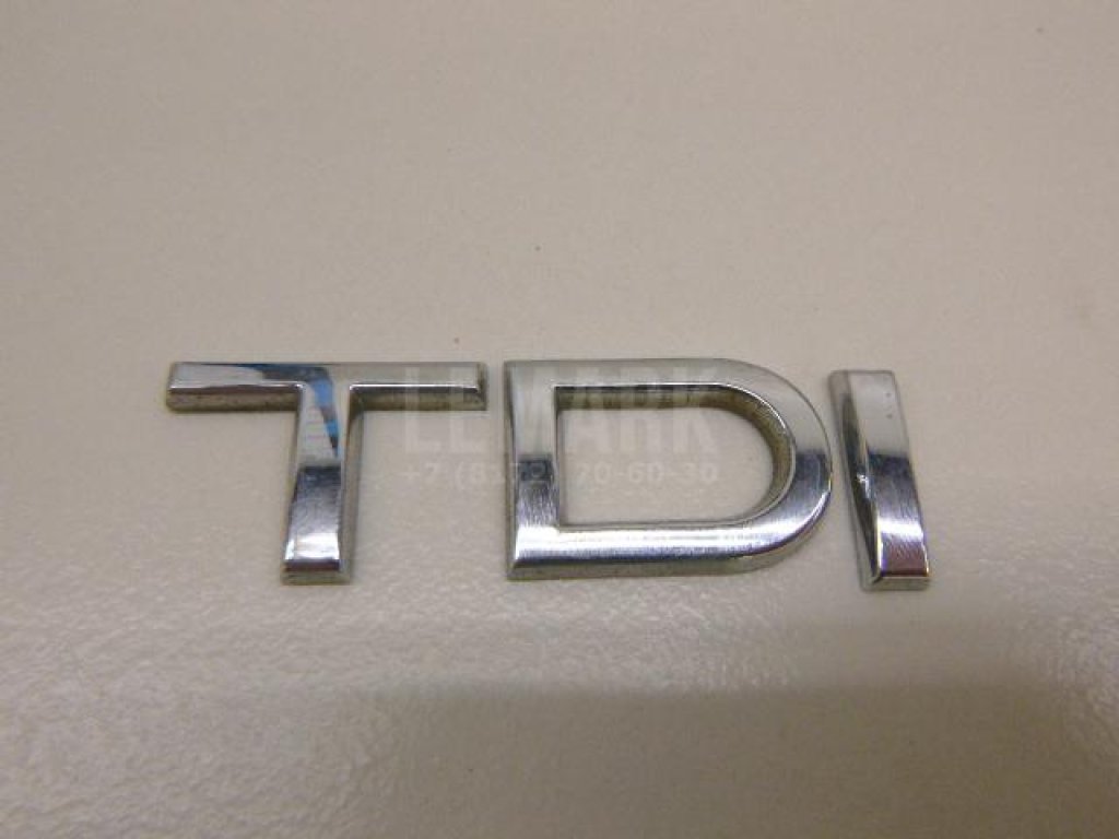 Эмблема на крышку багажника