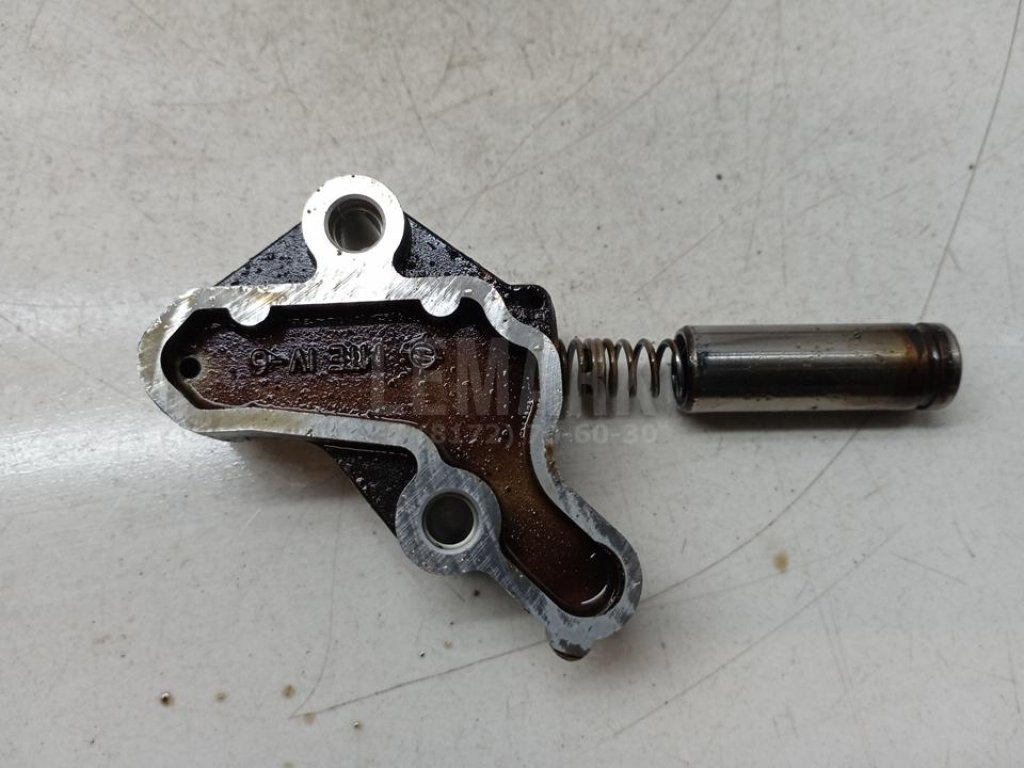 Натяжитель цепи