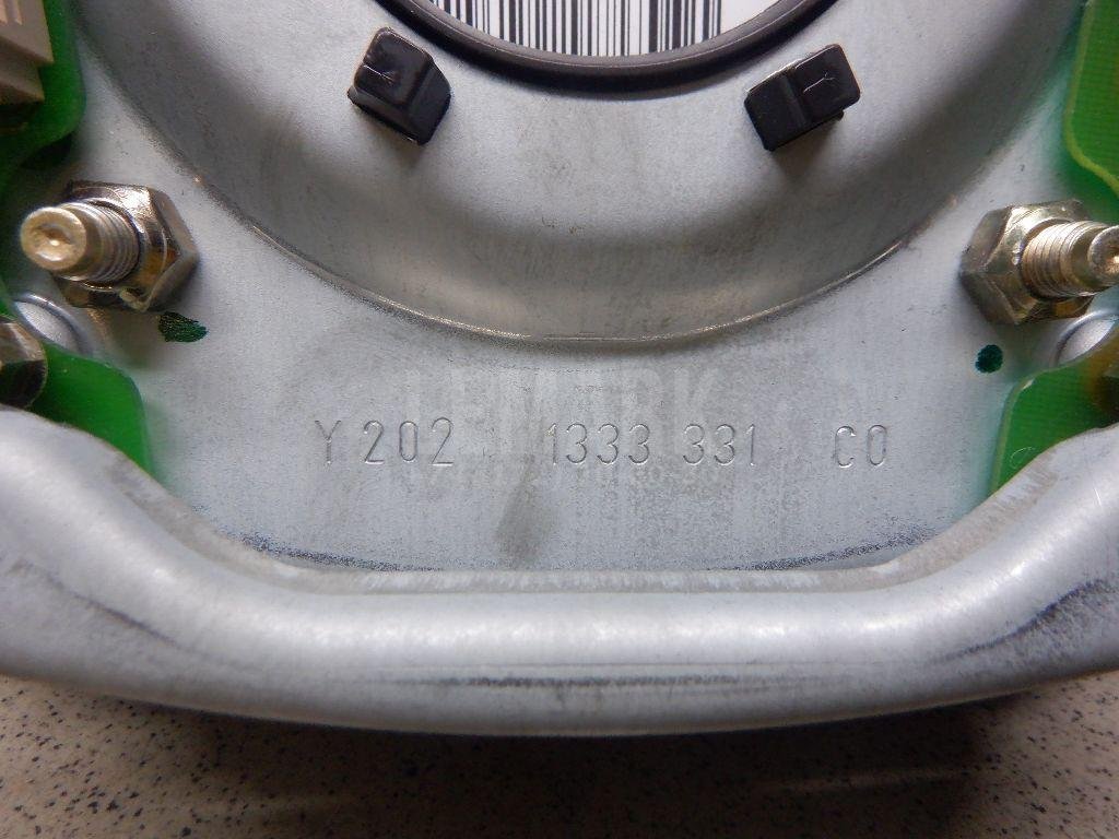 Подушка безопасности в рулевое колесо