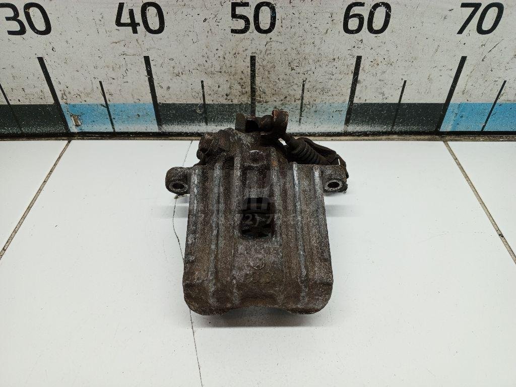 Суппорт тормозной задний левый