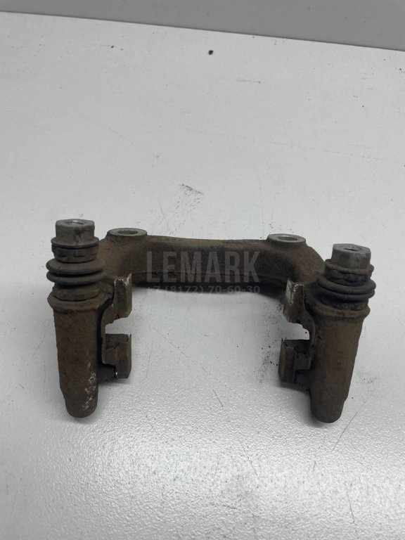 Скоба суппорта заднего левого