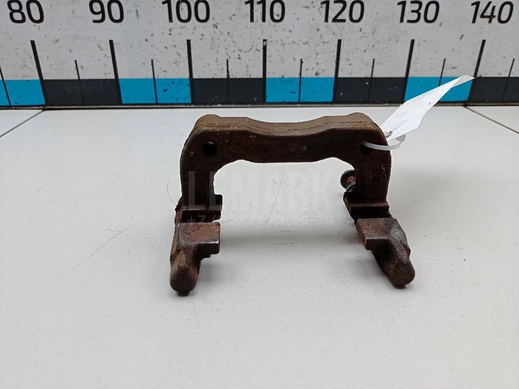 Скоба суппорта заднего левого