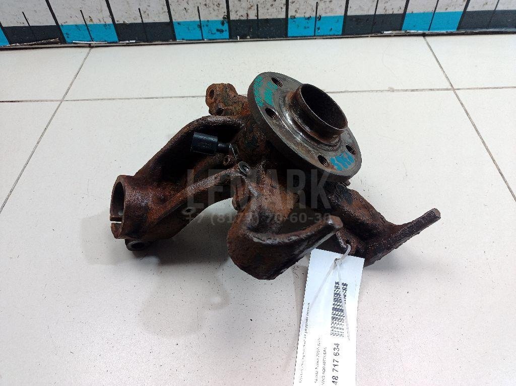 Кулак поворотный передний левый