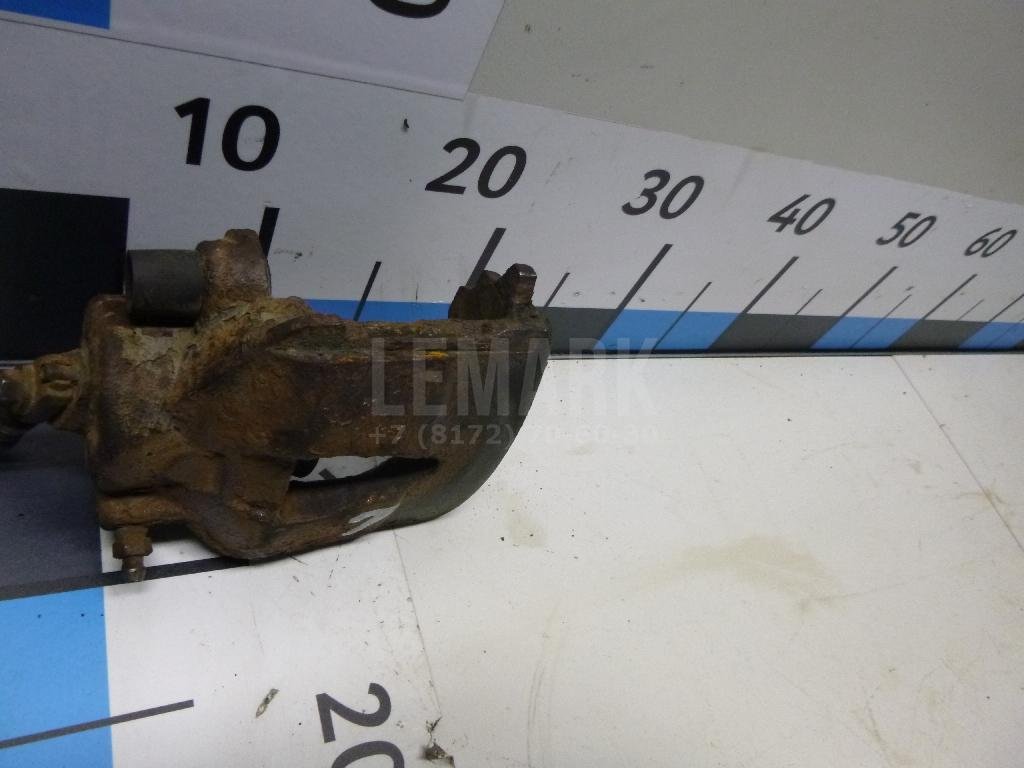 Суппорт тормозной передний левый