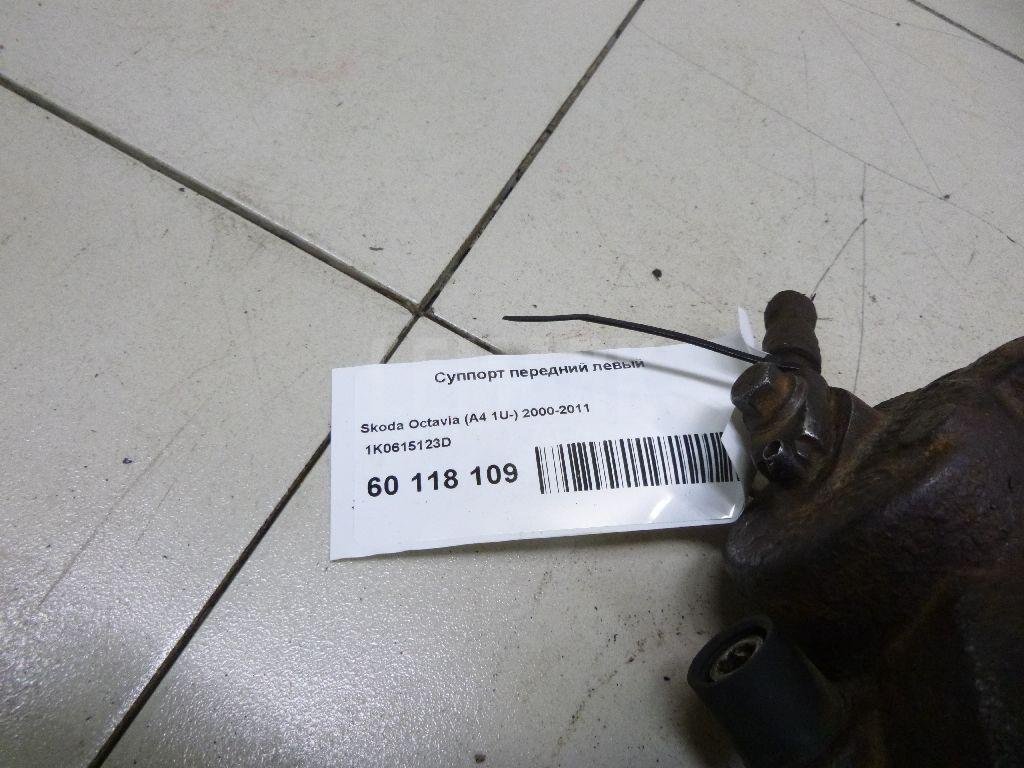 Суппорт тормозной передний левый