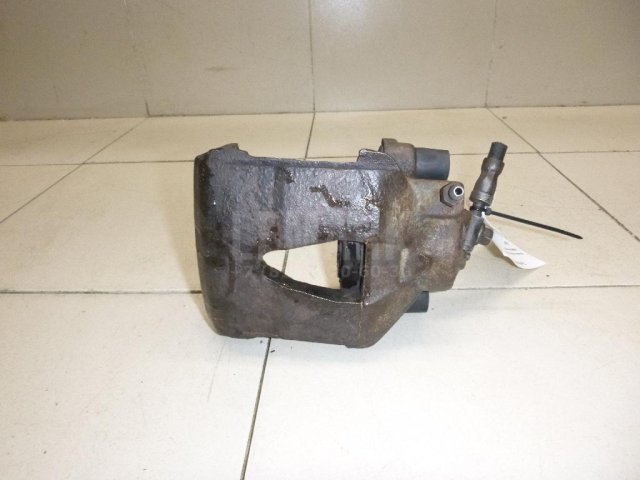 Суппорт тормозной передний левый