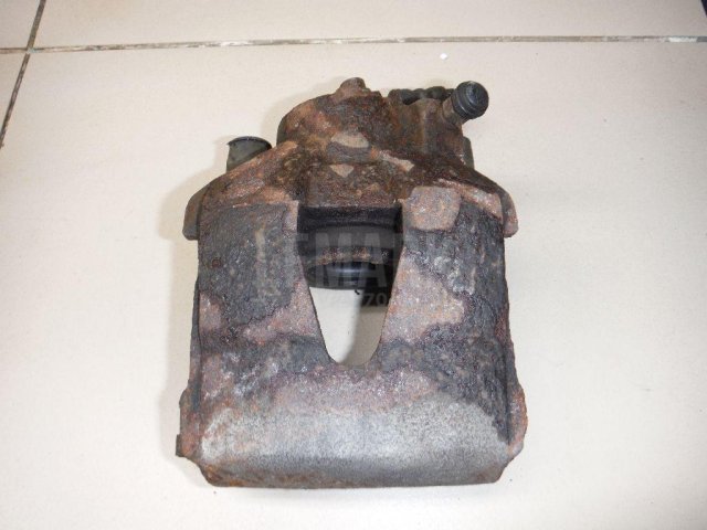 Суппорт тормозной передний левый