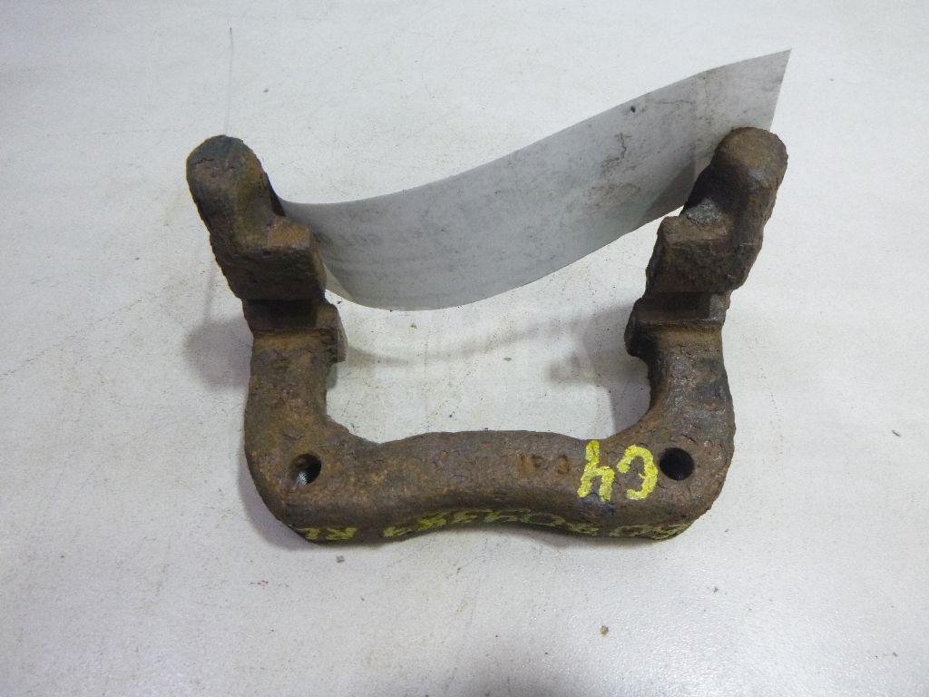 Скоба суппорта заднего левого