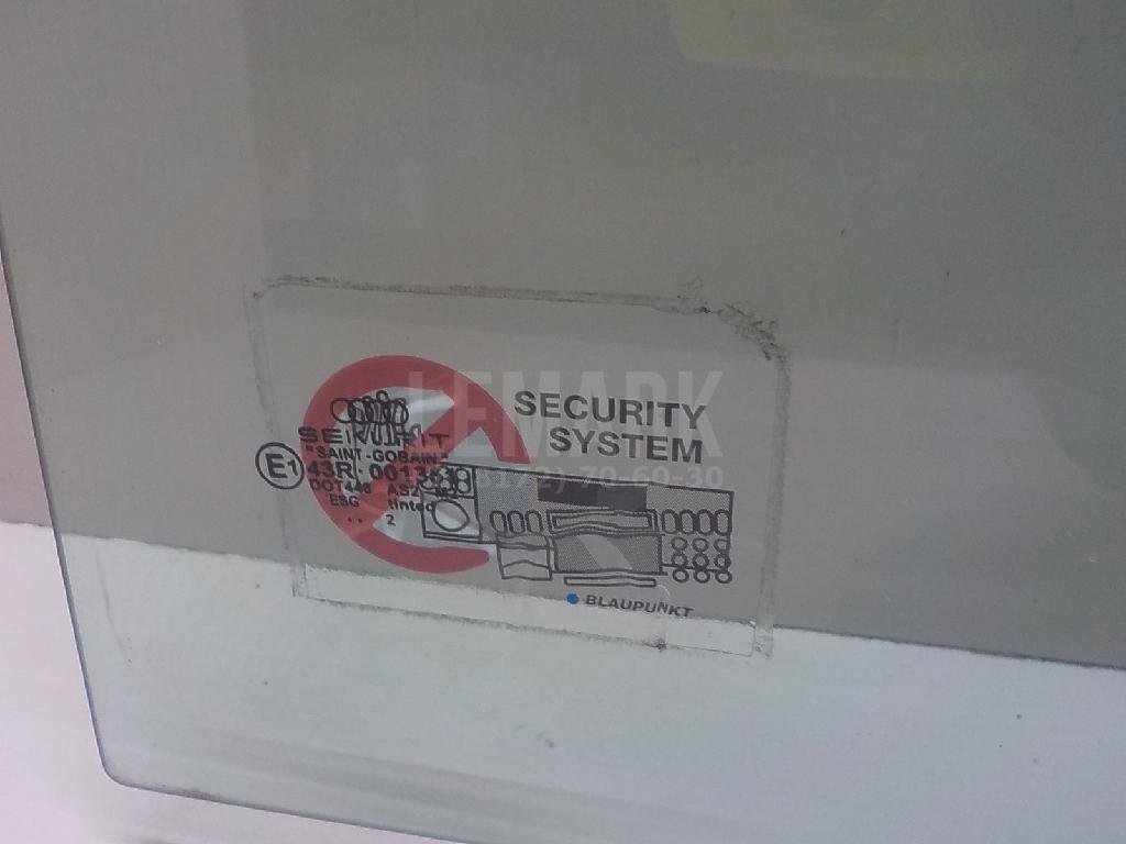 Стекло двери задней левой