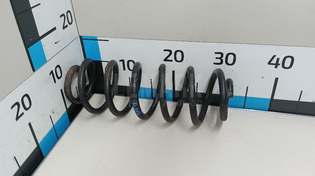 Пружина задняя