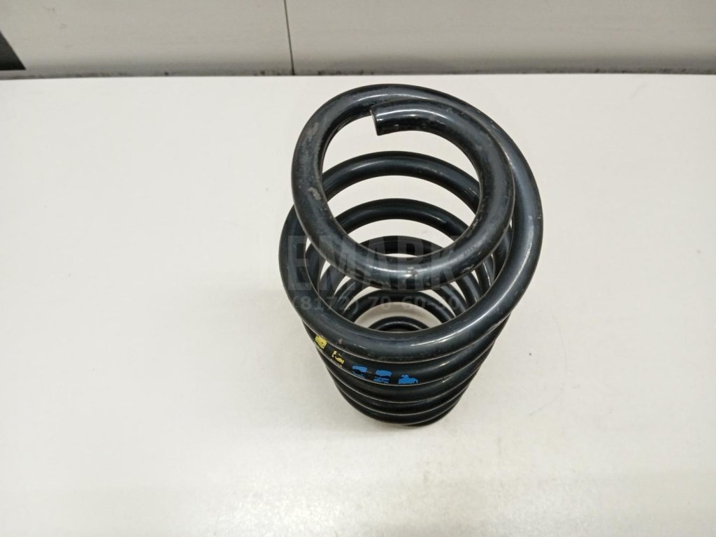 Пружина задняя