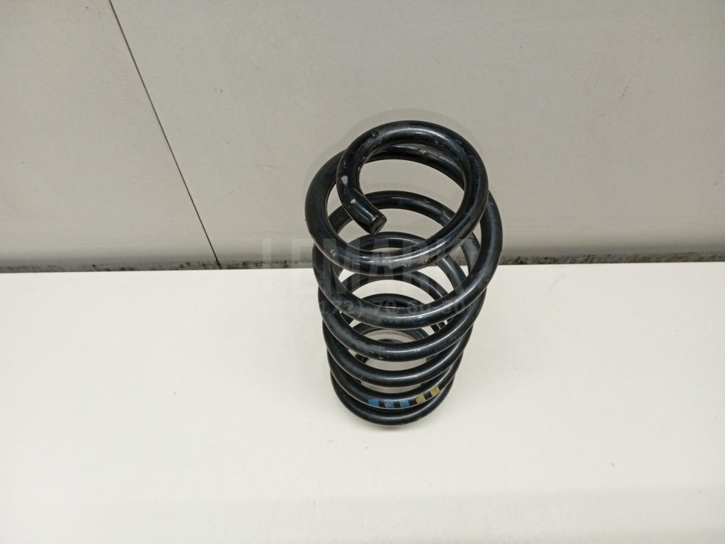 Пружина задняя