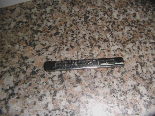 Эмблема на крышку багажника