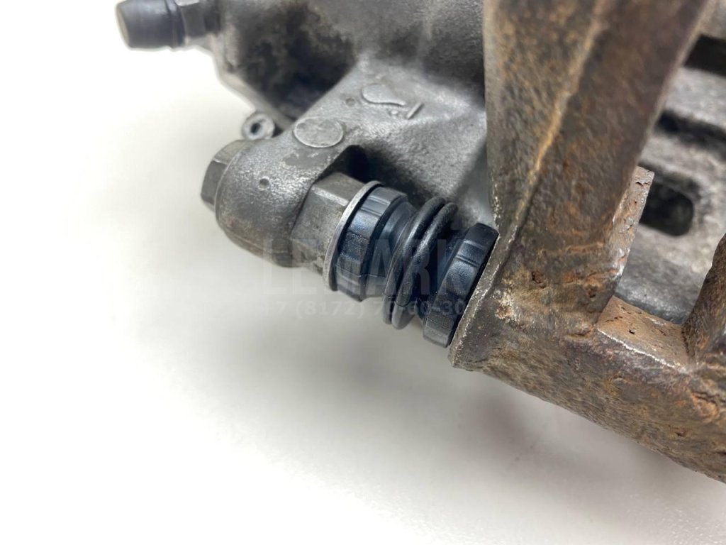 Суппорт тормозной задний левый