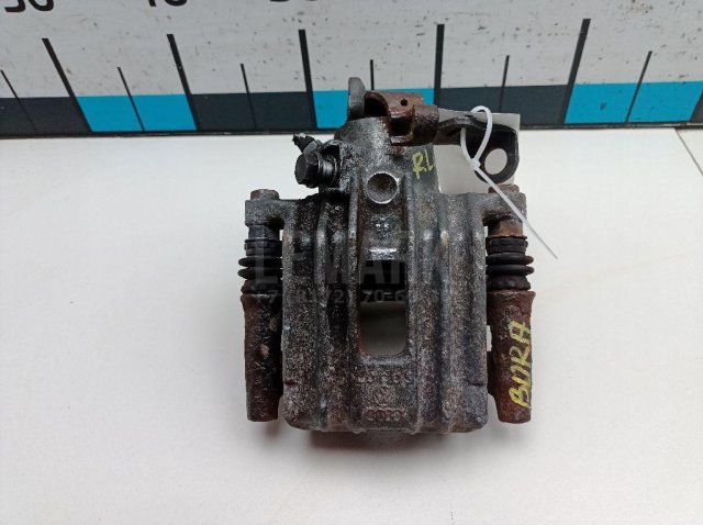 Суппорт тормозной задний левый