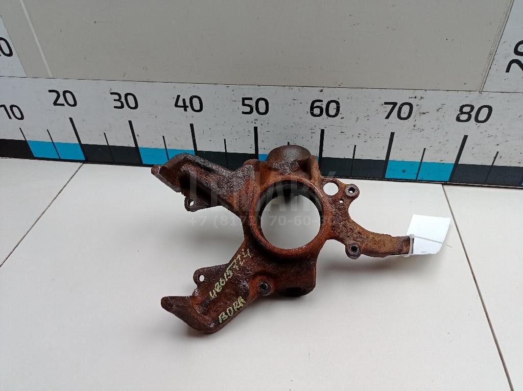 Кулак поворотный передний левый