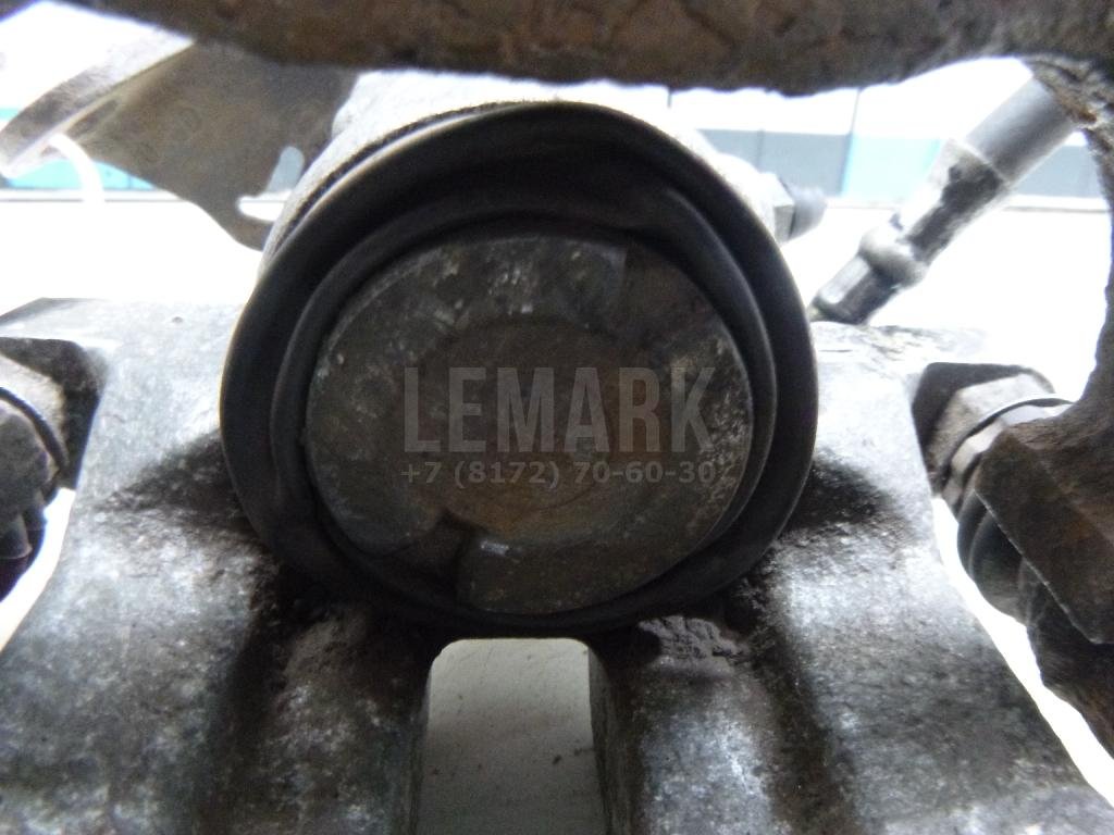 Суппорт тормозной задний левый