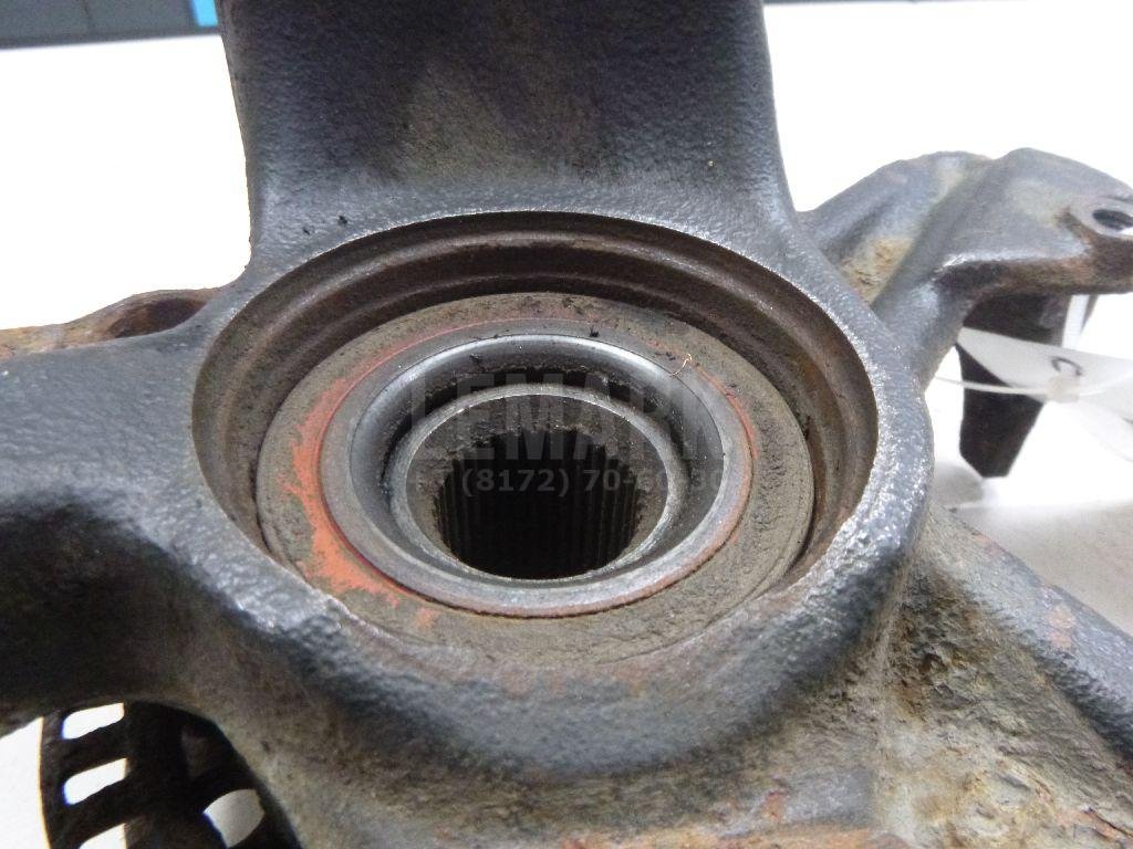 Кулак поворотный передний левый