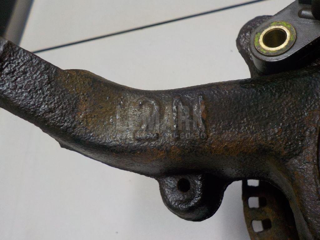 Кулак поворотный передний левый