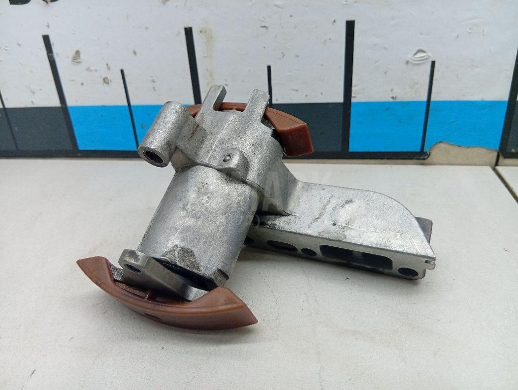 Натяжитель цепи